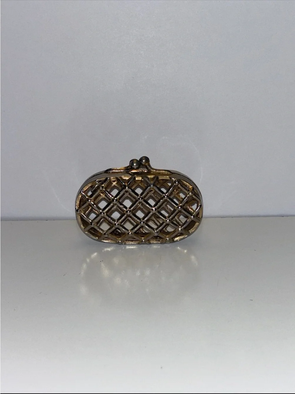 vintage metal cage or lattice-design mini coin clutch